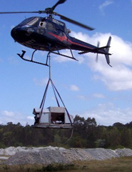 Chopper flying in Acid Solutions Pty Ltd machinery